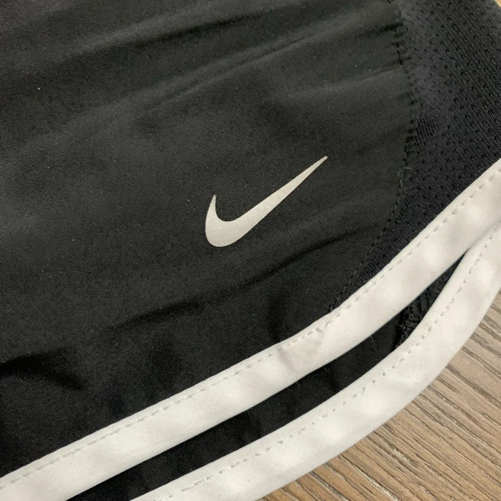 Nike black with white trim athletic shorts Size M